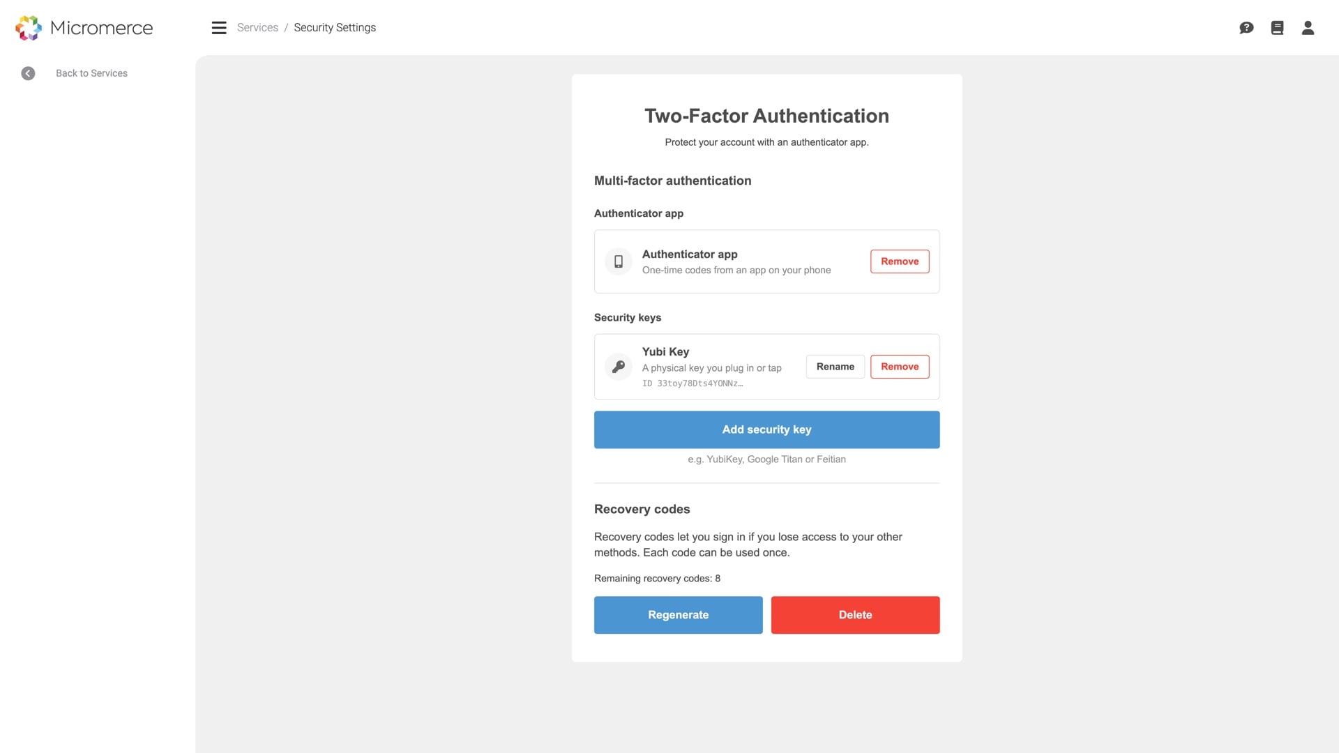 Two-factor settings in the Micromerce backoffice — an authenticator app and a registered hardware security key, with the option to add another and regenerate recovery codes