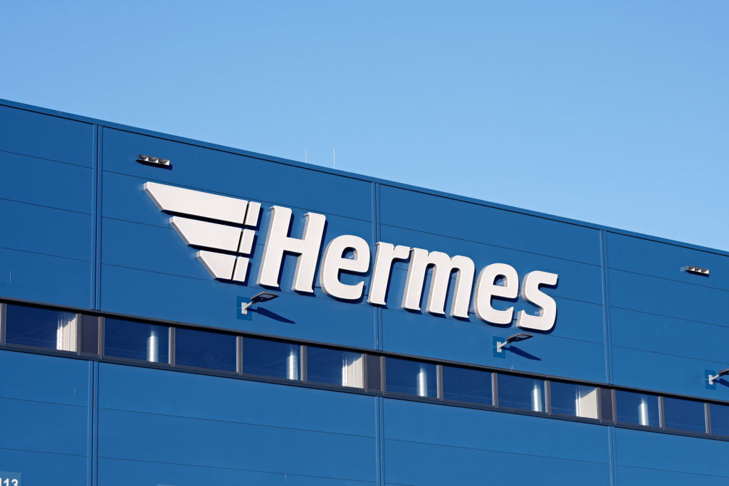 Hermes logistics centre with the company logo on the facade